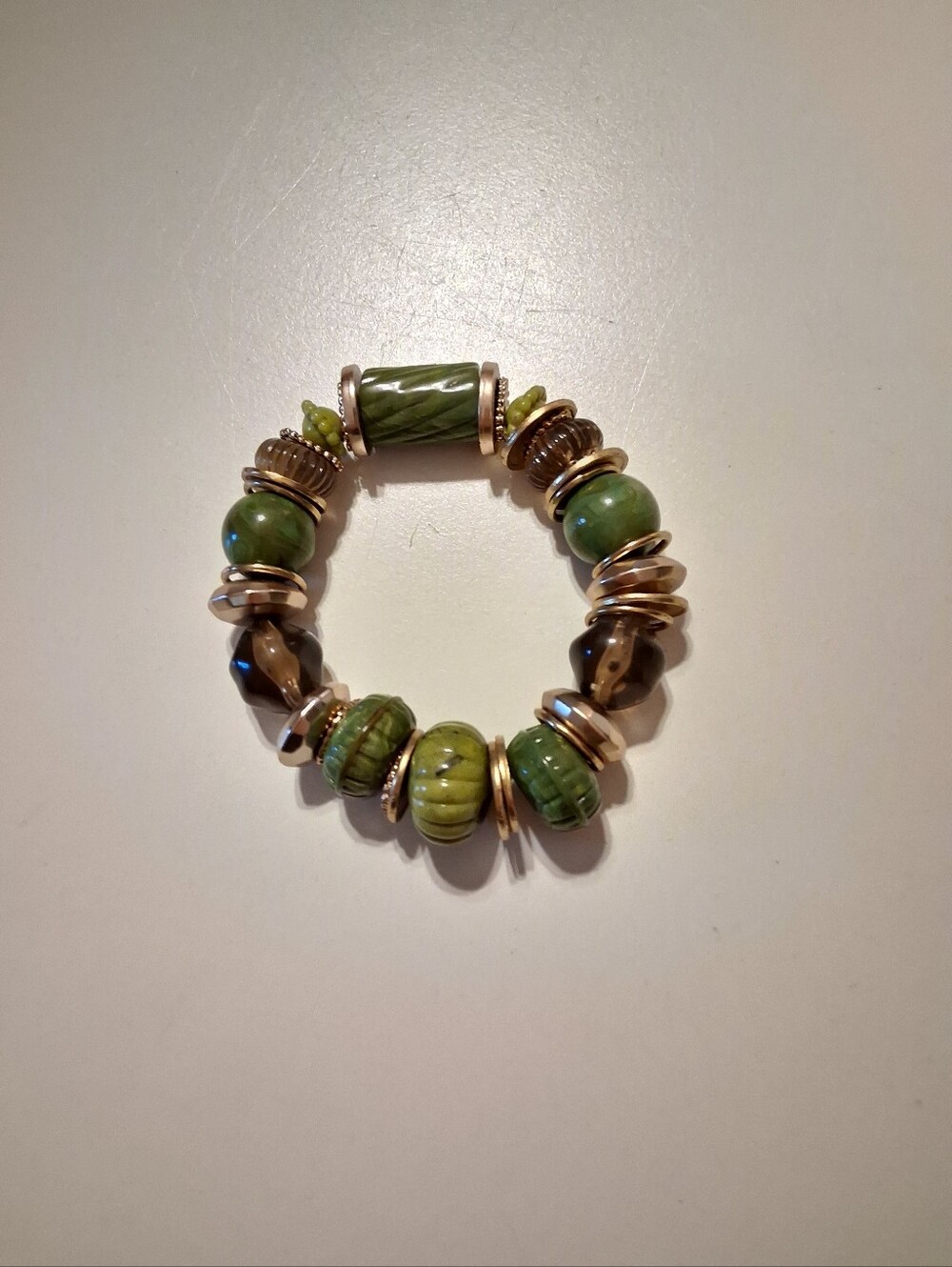 Green Bead Stretch Bracelet with Gold Accents